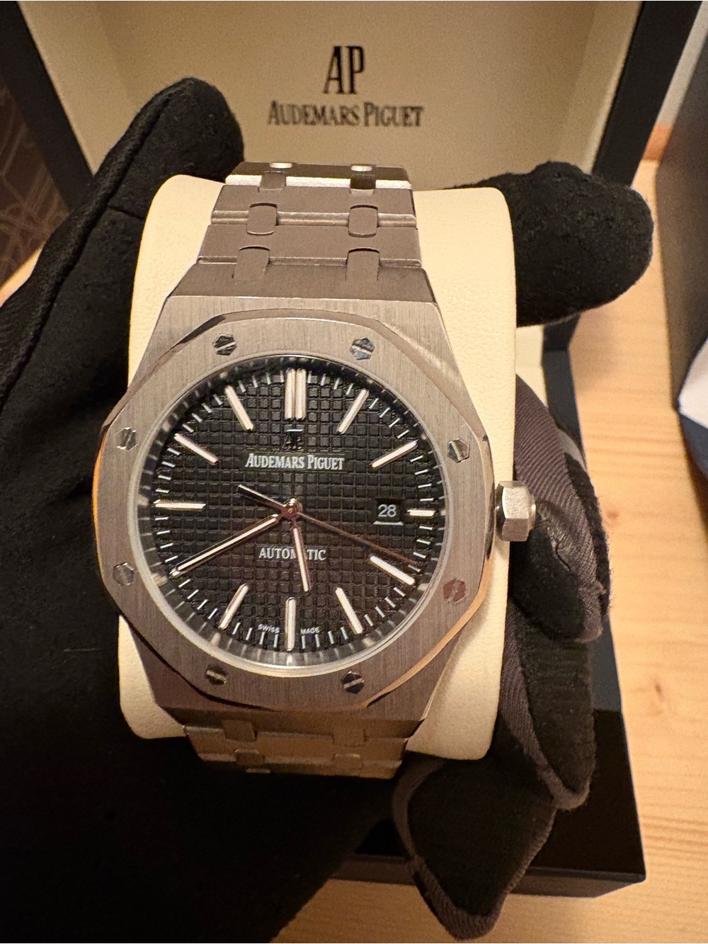 Audemars Piguet booklet/tag on table